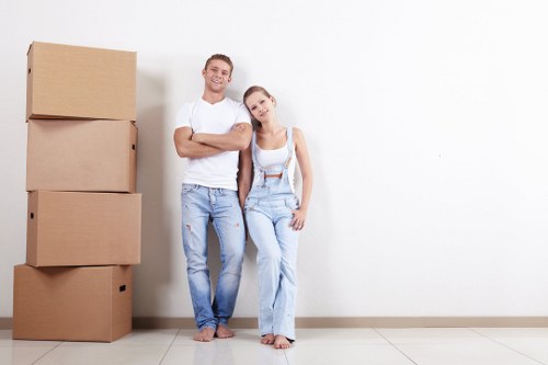 Removal team preparing a home move in Soho with boxes and furniture