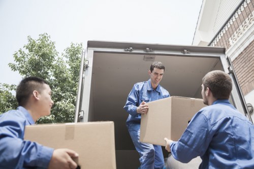 Prepared boxes and wrapped household items ready for flat removals in Soho