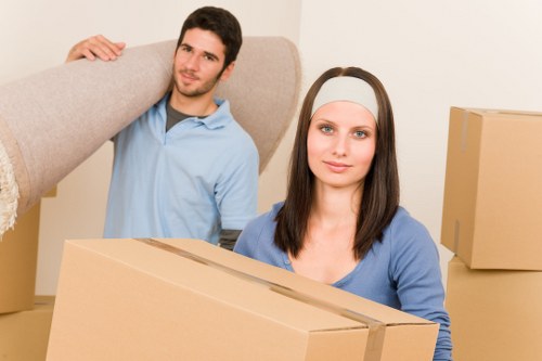 Safe furniture handling by a Soho man and van crew during a move
