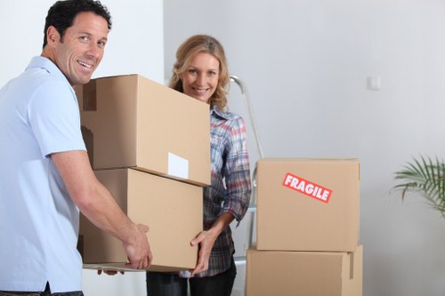 Packed furniture and moving supplies prepared for transport in Soho