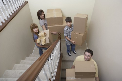 Furniture being moved carefully through a Soho residential building